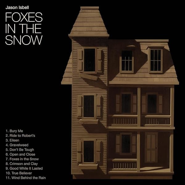Foxes In The Snow